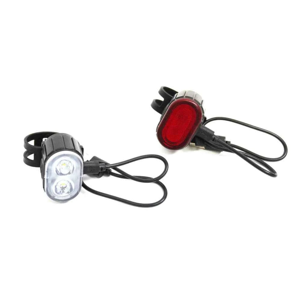 Travel Buggy LED safety light set featuring a white front headlight and a red rear taillight with flexible mounting straps.